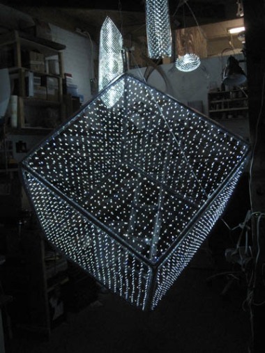 led cube made out of hand-soldered LED mesh